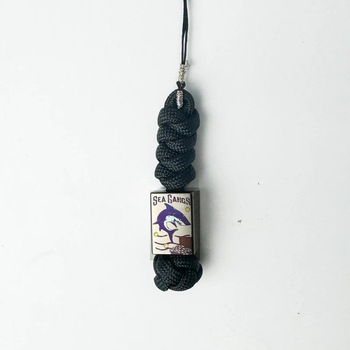 Sea Shark Titanium Lanyard Bead: silver shark bead on black woven cord (gallery view 09).