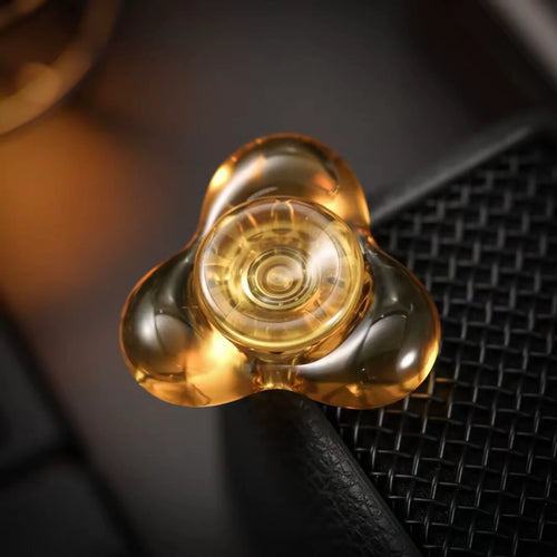 APD Three Lobe Cell fidget spinner in translucent amber PEI