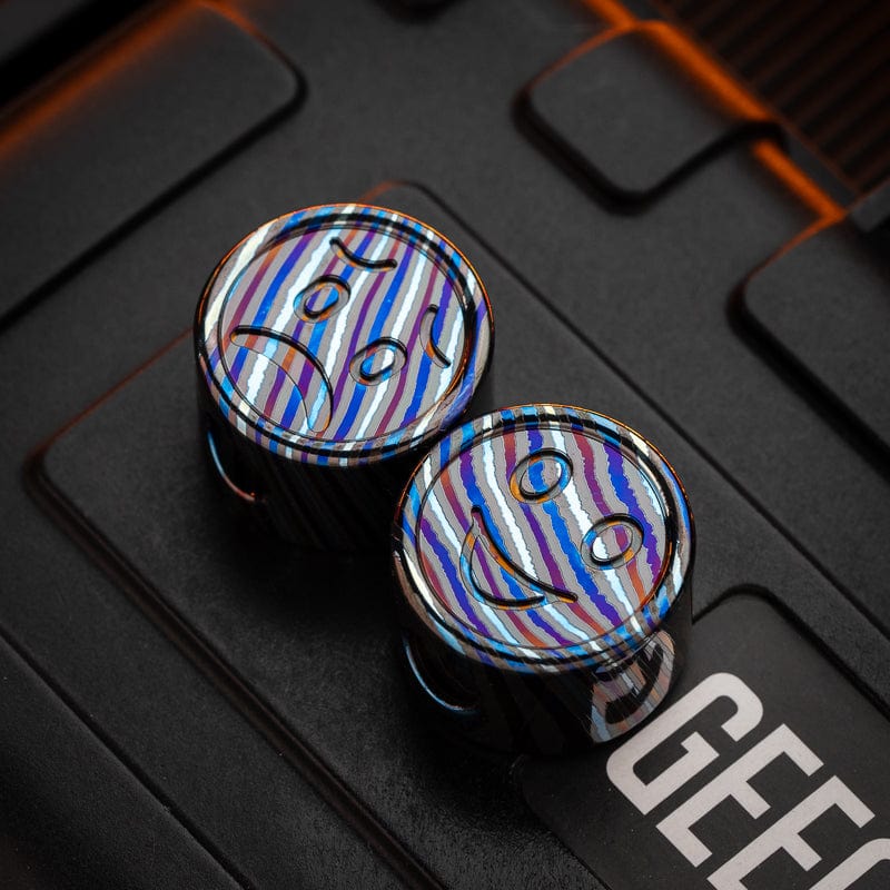 EDC Lanyard Bead – Bad Guy Smile | Titanium Zirconium Damascus Mokuti Super Conductor