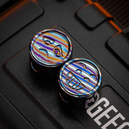EDC Lanyard Bead – Bad Guy Smile | Titanium Zirconium Damascus Mokuti Super Conductor
