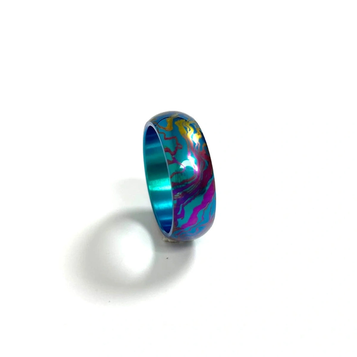 Anodized Titanium Band Ring: blue pink and purple patterned ring on white (gallery view 10).