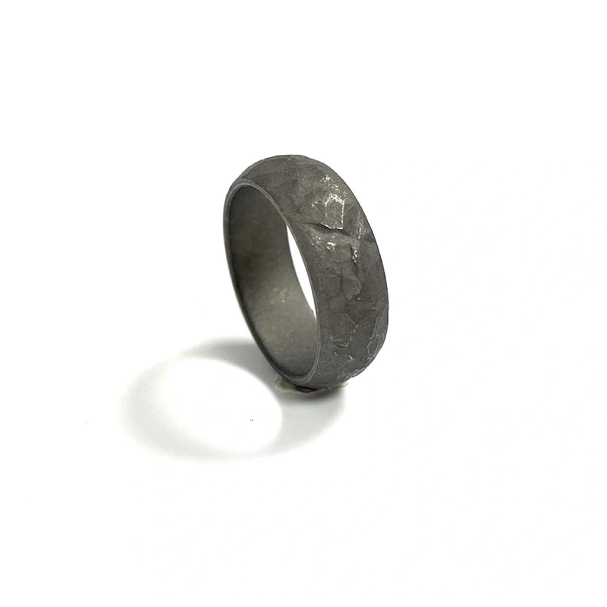 Anodized Titanium Band Ring: dark gray textured pattern ring on white (gallery view 13).