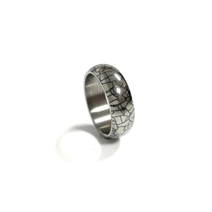 Anodized Titanium Band Ring: silver dark crackle patterned ring on white (gallery view 12).