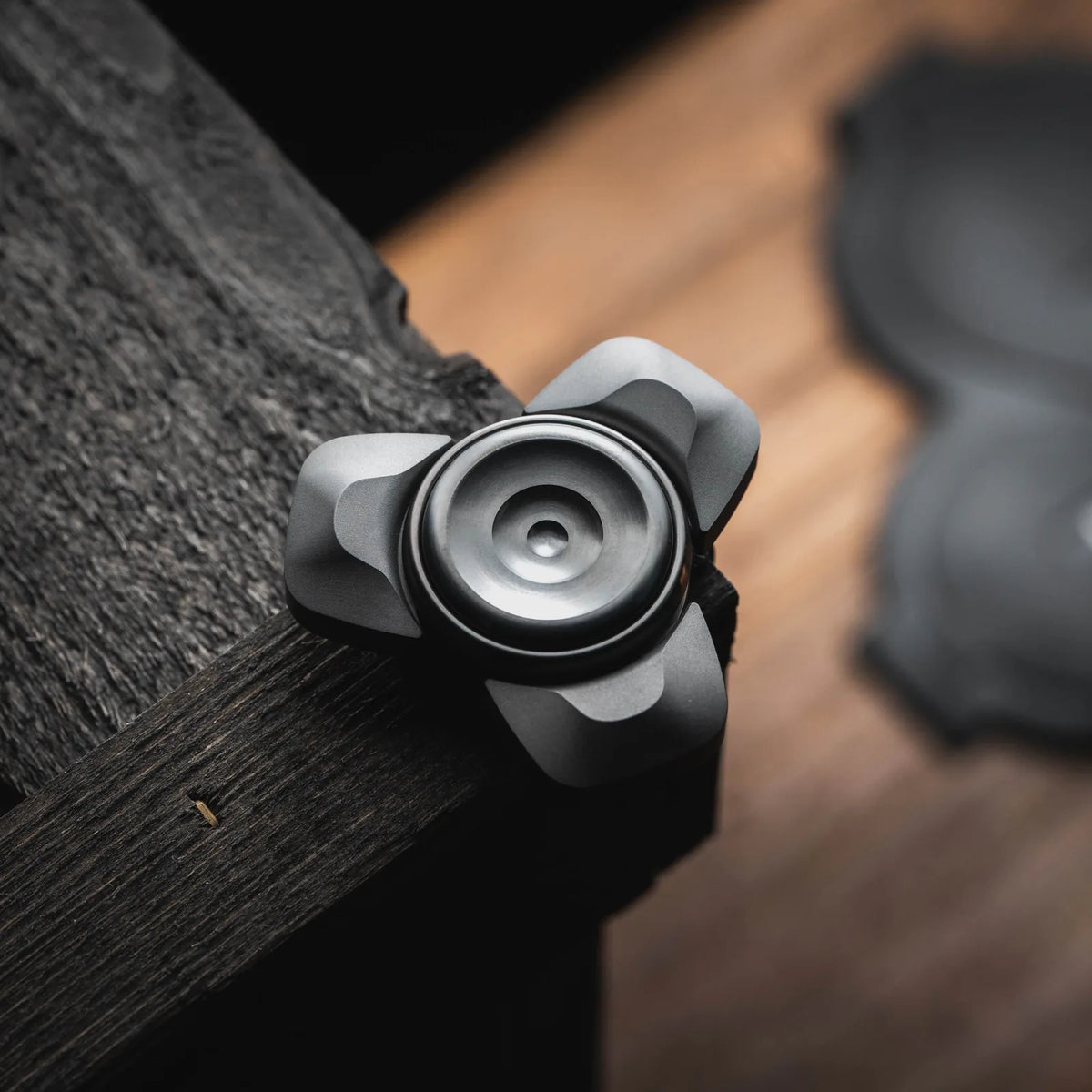 Dark River three lobe spinner with layered center button