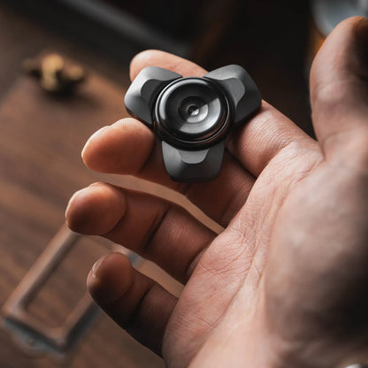 Blacktopworks metal fidget spinner held in hand