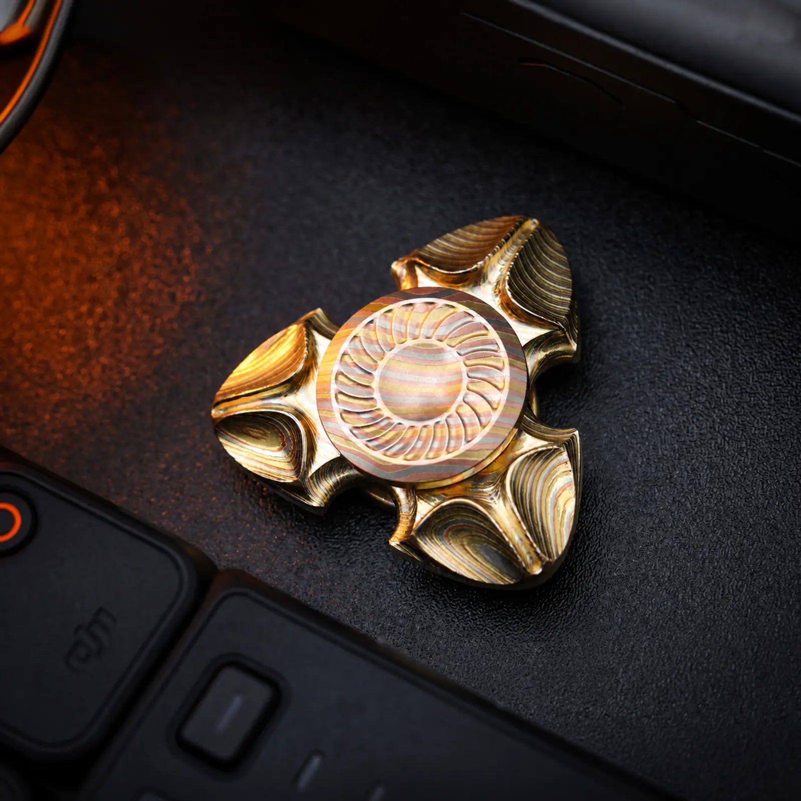 Chimago Demon Xumi fidget spinner in layered copper