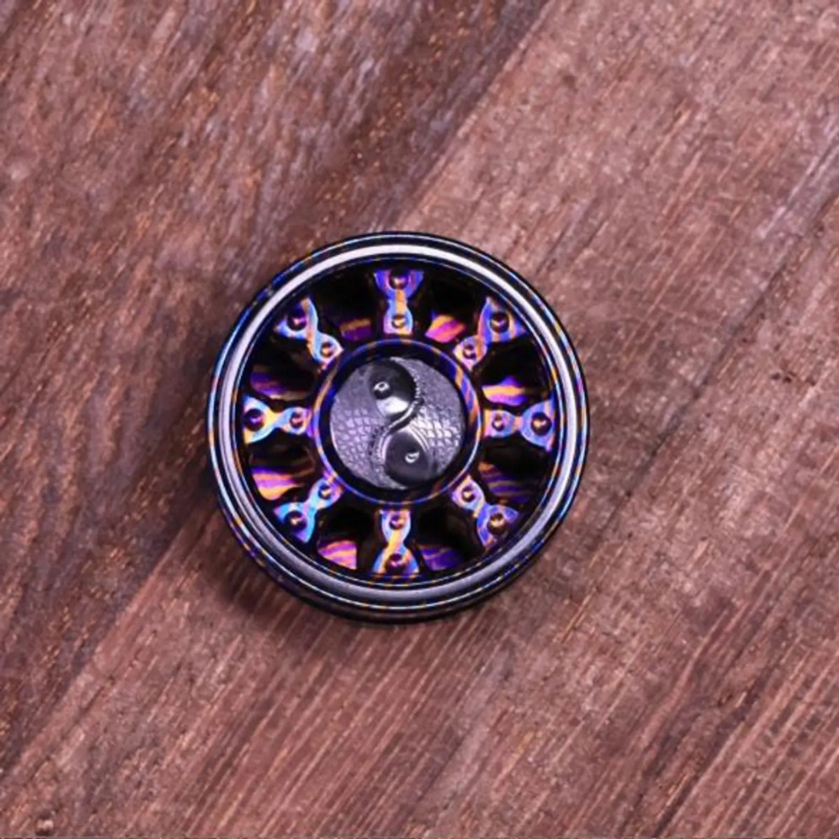 Metal fidget spinner buttons arranged for DIY installation
