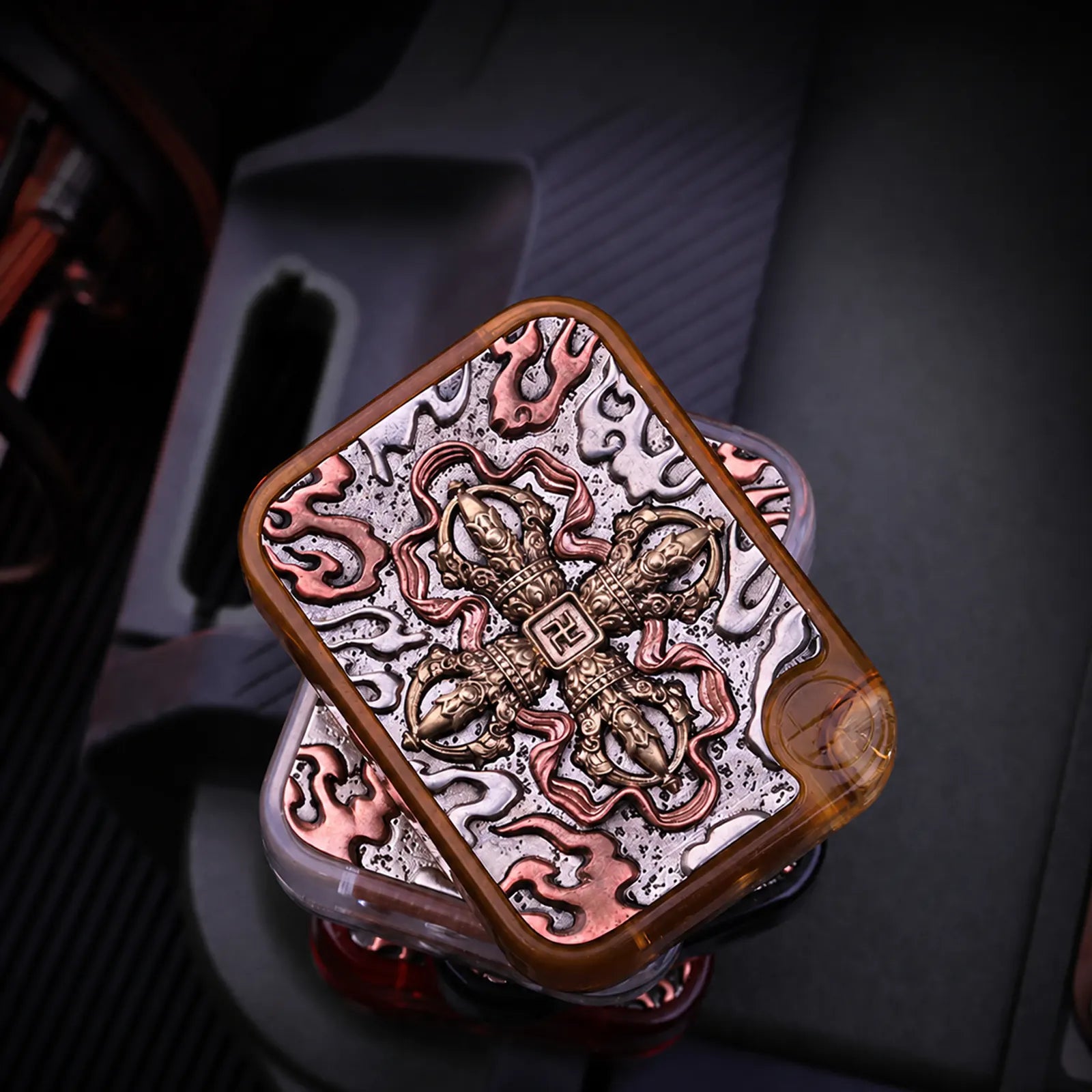 Chimago relief art fidget slider shown for handheld EDC play