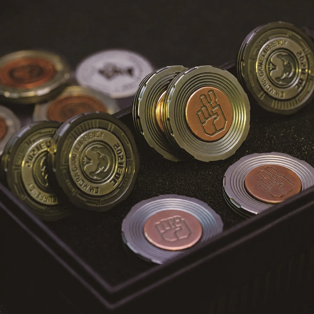 Chimago decision coins shown in multiple metal finishes