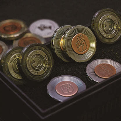 Chimago decision coins shown in multiple metal finishes