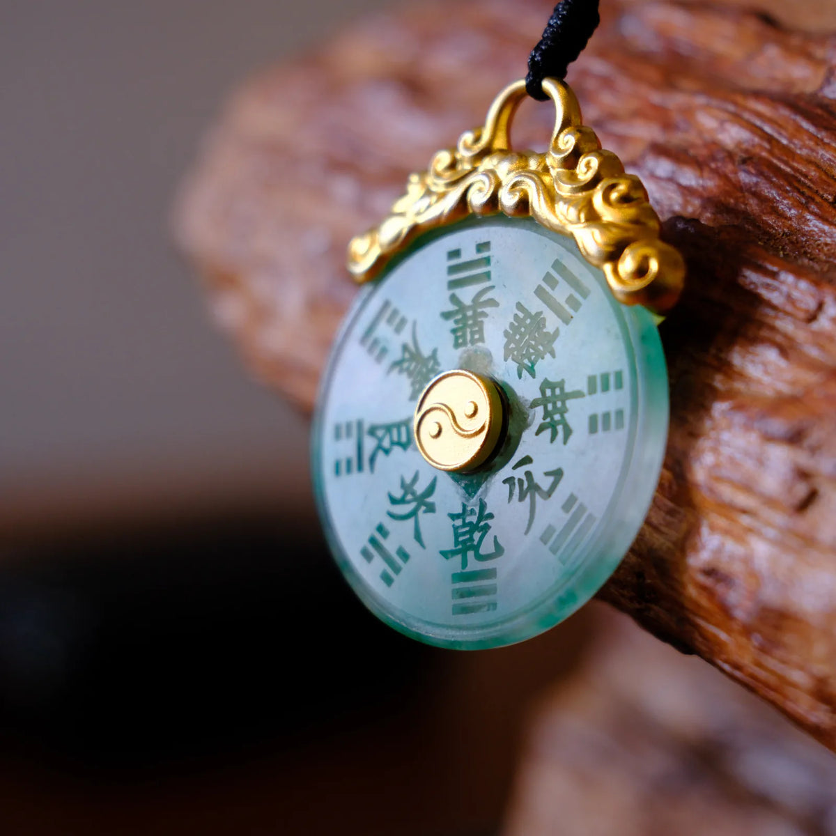 CNC carved rotating stone pendant shown from the front