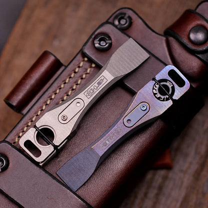 Chimago titanium pry bars arranged on a leather EDC pouch