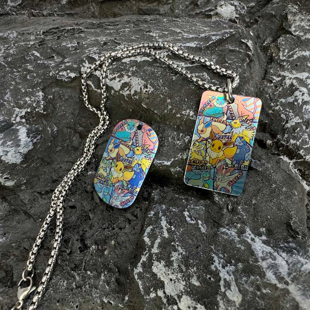 Pokemon Artwork Titanium Dog Tag: two illustrated dog tag body designs with chains (gallery view 02).