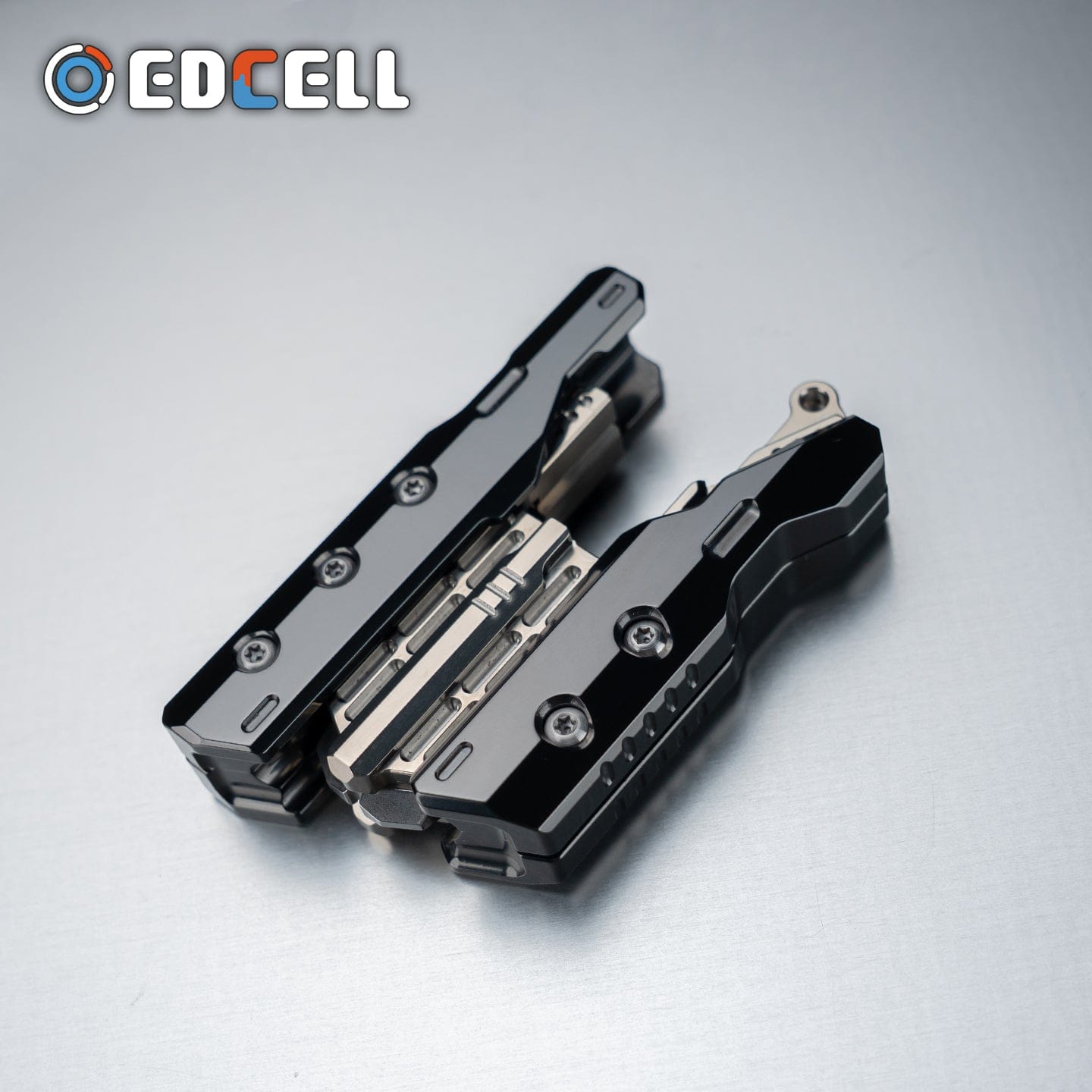 Tactile Slider – EDCell Breaker | Zirconium Titanium Carbon Fiber EDC Push Slider