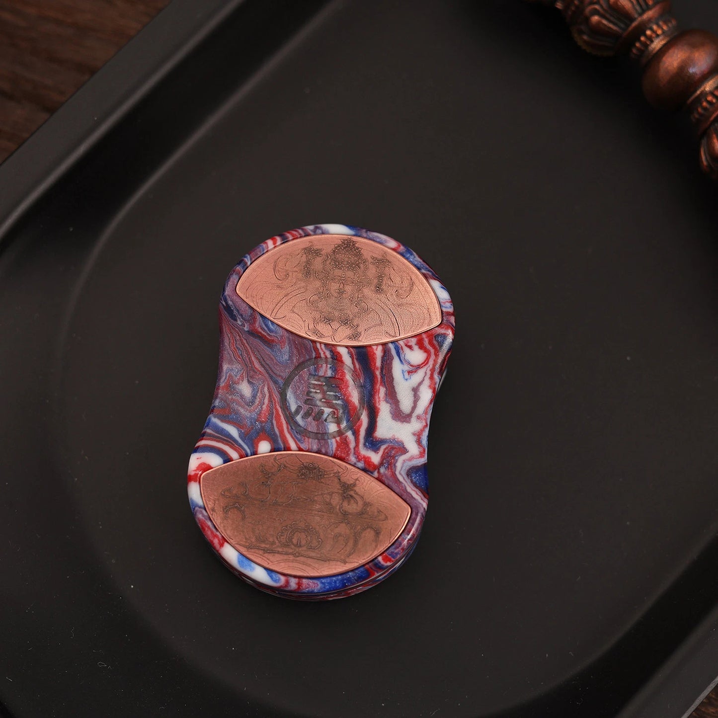 Back of CHIMAGO Wrath resin slider with engraved copper inlay