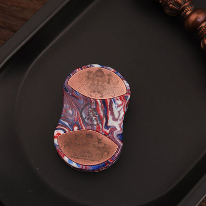 Back of CHIMAGO Wrath resin slider with engraved copper inlay