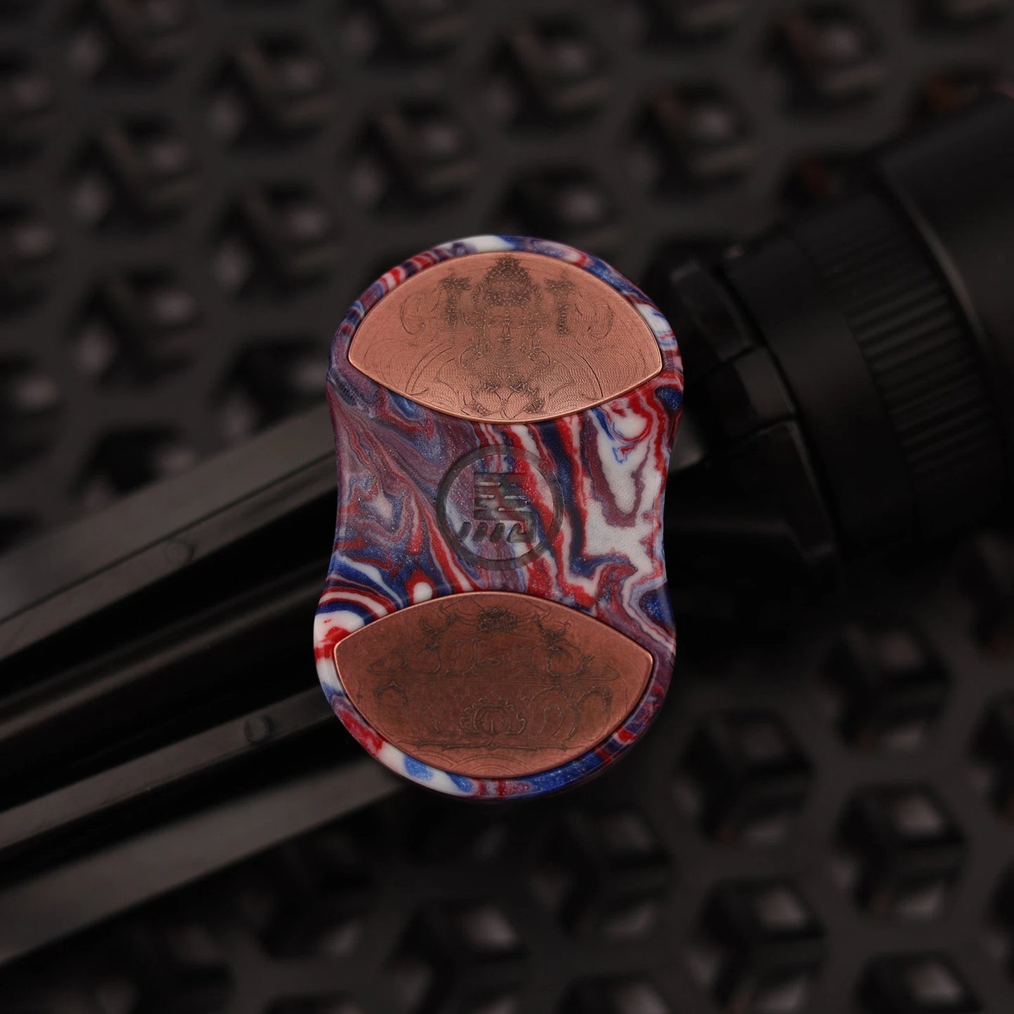 Engraved copper rear inlay on CHIMAGO Wrath fidget slider