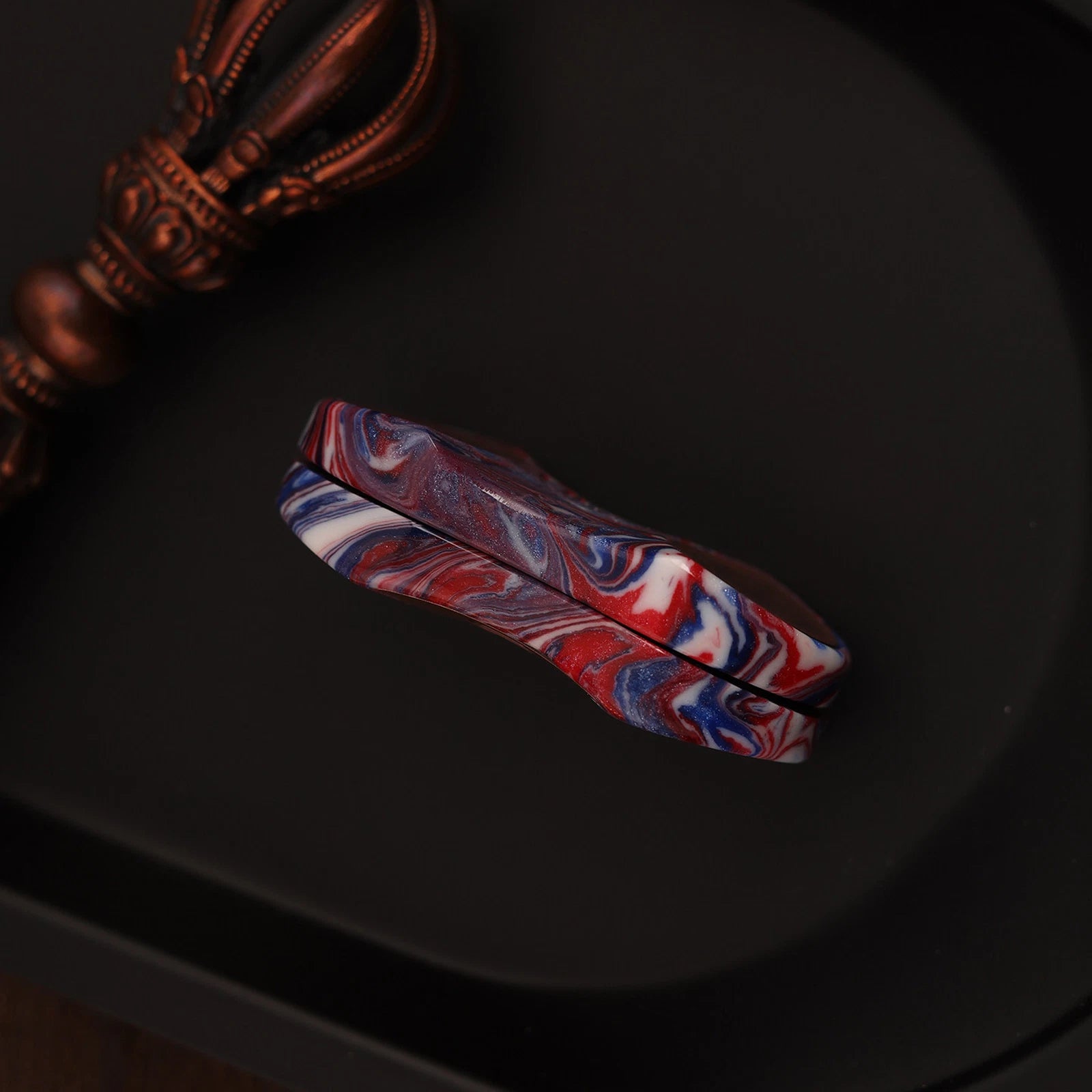 Slim side profile and straight-push action of CHIMAGO Wrath slider