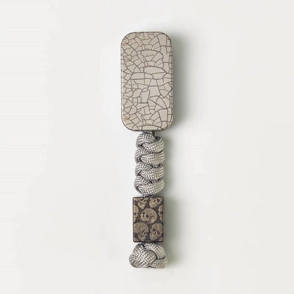 Crackle Pattern Titanium Fidget Slider: crackle slider on gray bead lanyard (gallery view 04).