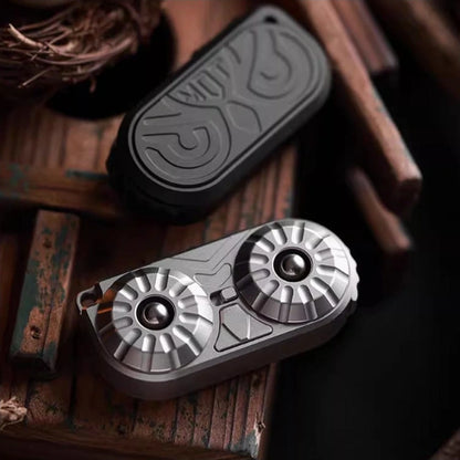 Owl-Face Stainless Steel Fidget Slider: front and reverse faces of natural and black versions (gallery view 02).