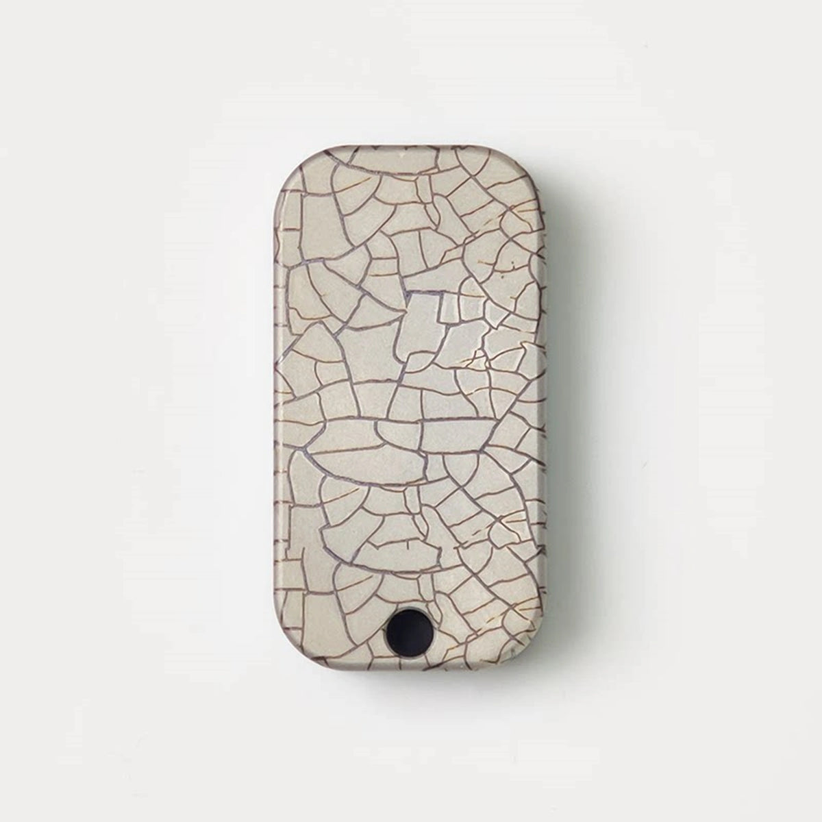 Crackle Pattern Titanium Fidget Slider: reverse crackle face with attachment hole (gallery view 03).