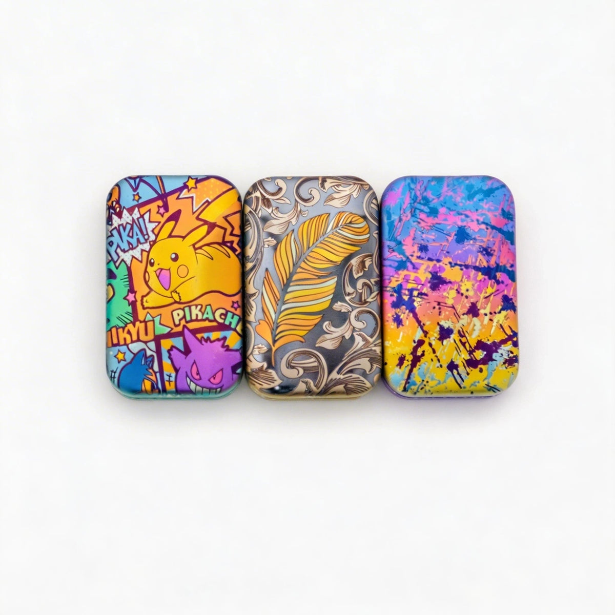 Rotating Titanium Fidget Slider: three illustrated face designs standing together (gallery view 01).