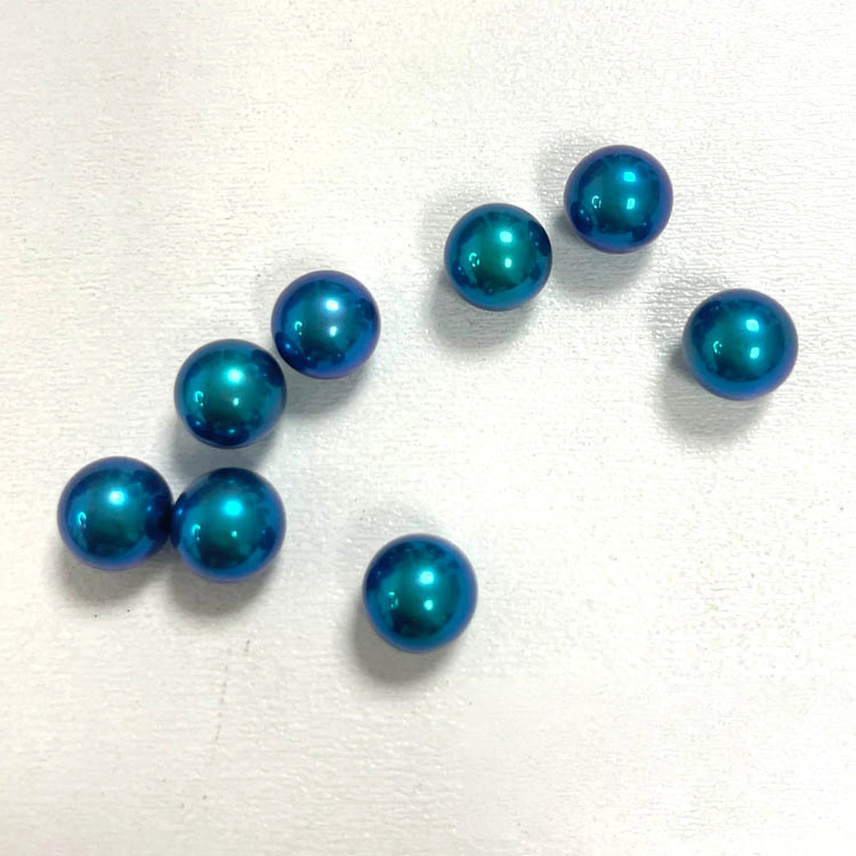 Titanium Spinner Balls: peacock blue plain balls on white (gallery view 07).