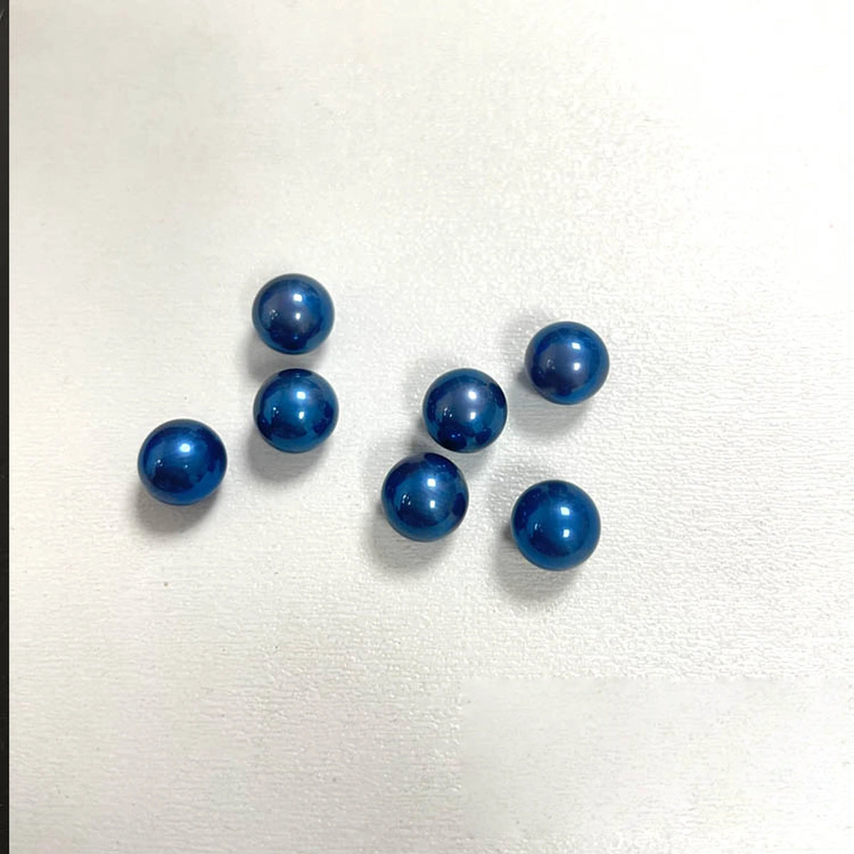 Titanium Spinner Balls: second ice blue ball grouping on white (gallery view 16).