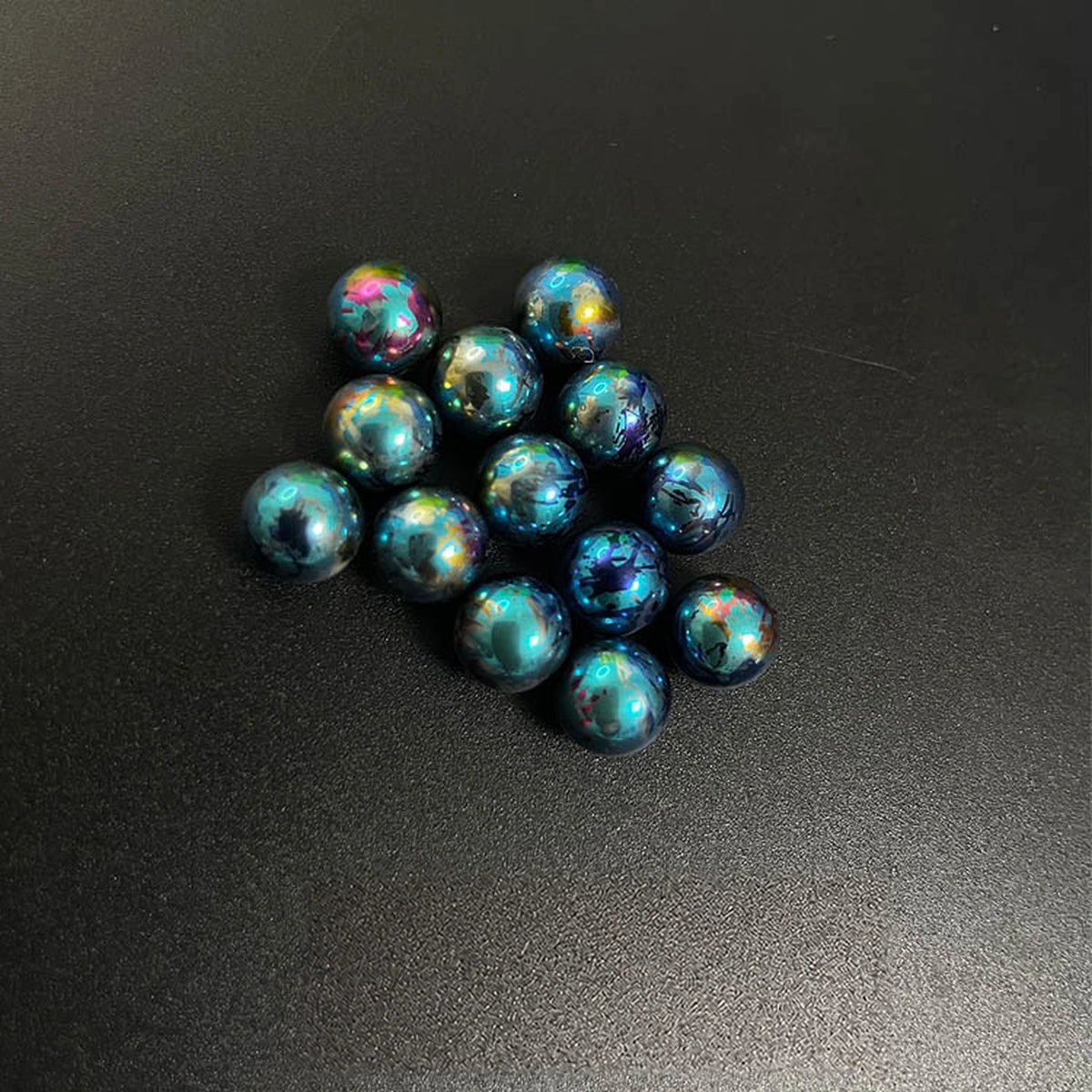 Titanium Spinner Balls: second splatter peacock blue ball grouping (gallery view 25).