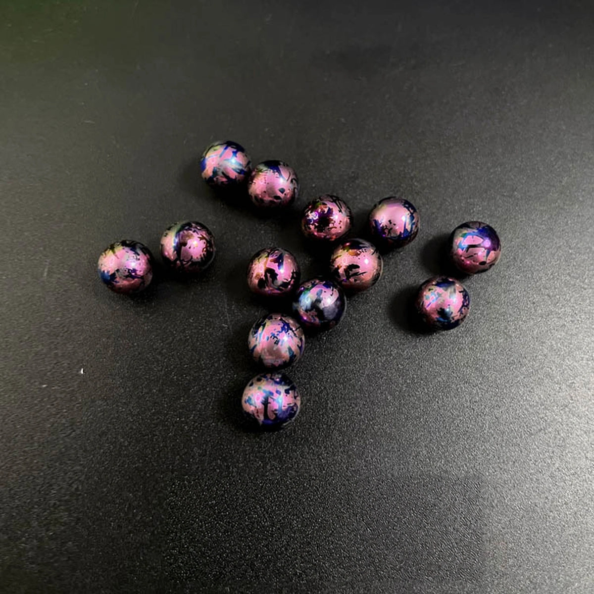 Titanium Spinner Balls: second splatter rose red ball grouping (gallery view 22).