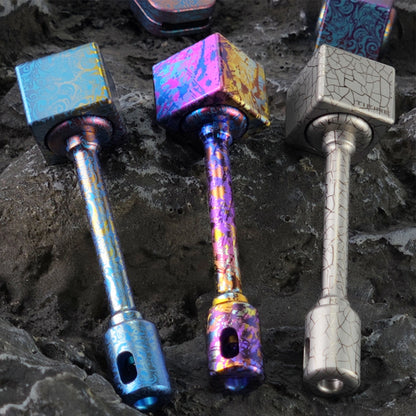 Square Titanium Fidget Spinner: three complete patterned handle assemblies on stone (gallery view 02).