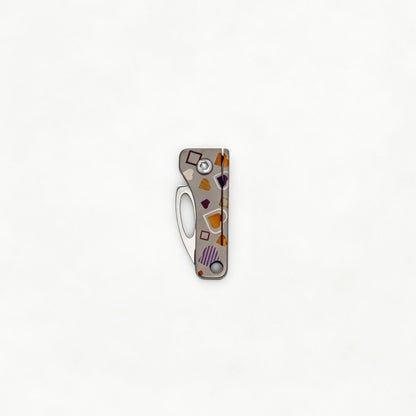 Compact Titanium Folding Keychain Knife: gray heart-pattern handle with blade folded (gallery view 04).