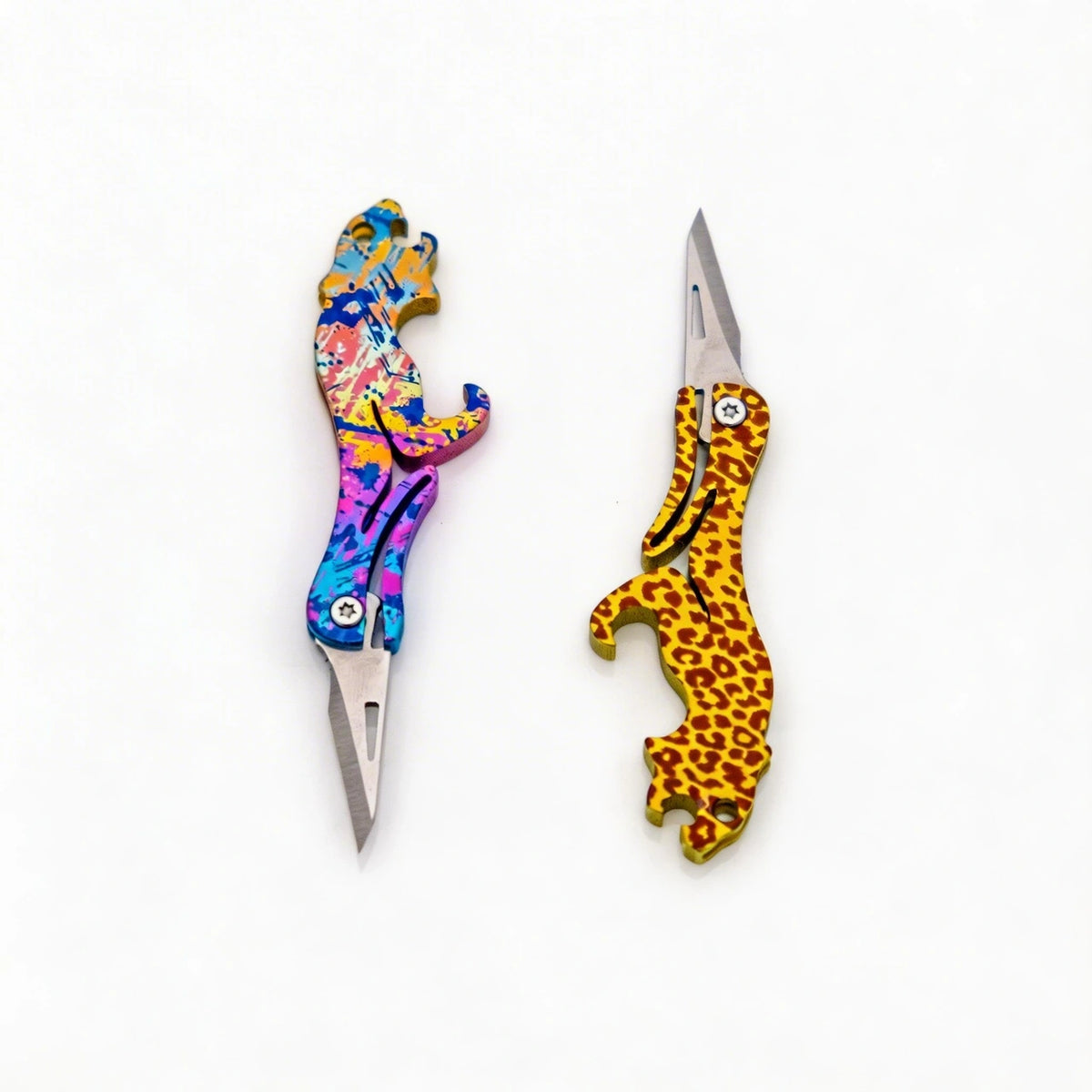 Animal-Shaped Titanium Folding Knife & Bottle Opener: two patterned handles with blades open (gallery view 02).