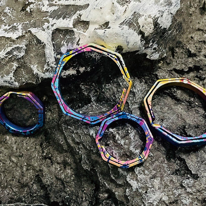 Octagonal Titanium Key Ring: overlapping octagonal rings on stone (gallery view 03).