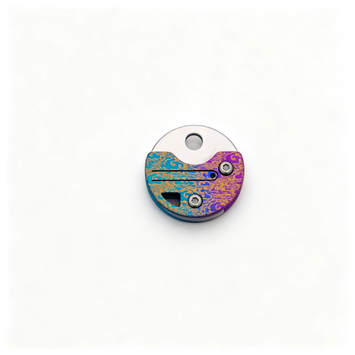 Coin-Shaped Titanium Keychain Knife: round multicolor handle folded on white (gallery view 03).