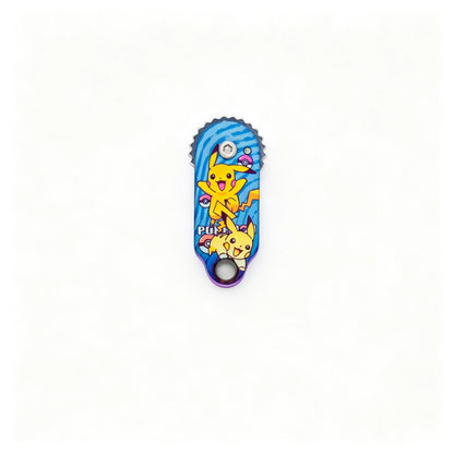 Gear-Edge Titanium Keychain Knife: yellow character artwork handle folded on white (gallery view 06).