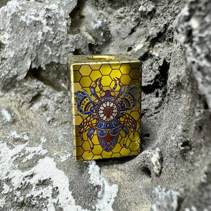 Bee Emperor Titanium Lanyard Bead: angled bee artwork front face (gallery view 05).