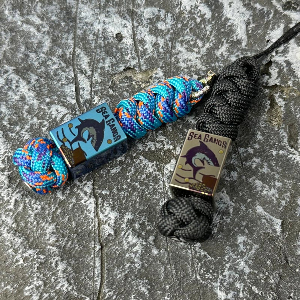 Sea Shark Titanium Lanyard Bead: blue and silver shark bead lanyards compared (gallery view 01).