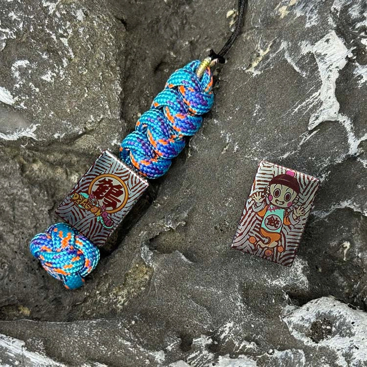 Dragon Ball Chiaotzu Titanium Bead: braided lanyard and separate bead comparison (gallery view 03).