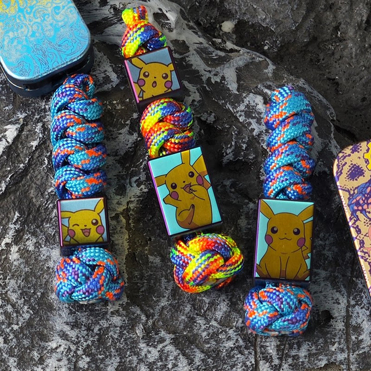 Pikachu Artwork Titanium Lanyard Beads: character bead lanyards compared on stone (gallery view 01).