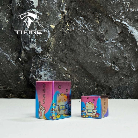 Lucky Cat Titanium Lanyard Beads: large and small lucky cat beads on stone (gallery view 01).