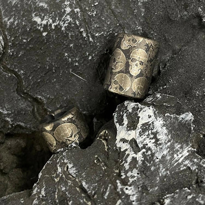Dark Skull Titanium Lanyard Beads: large round skull bead beside small bead (gallery view 04).