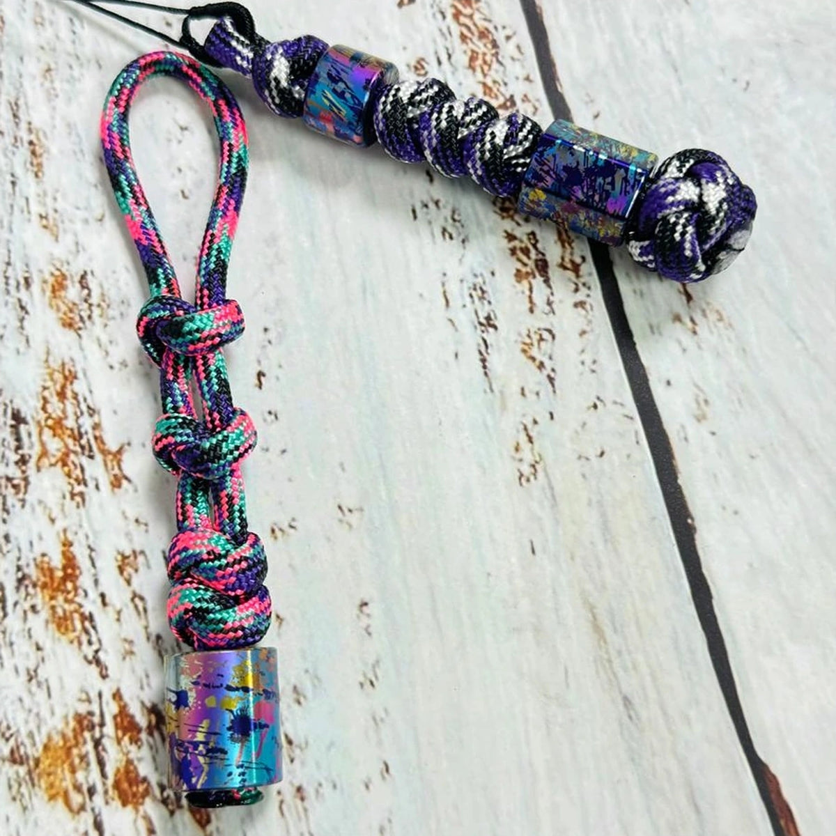 Classic Splatter Titanium Lanyard Beads: pink and purple braided bead lanyards compared (gallery view 02).