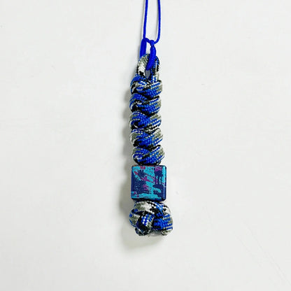 Classic Splatter Titanium Lanyard Beads: small square bead on blue purple cord (gallery view 11).
