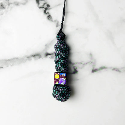 Planet Artwork Titanium Lanyard Beads: small square bead on dark patterned cord (gallery view 12).
