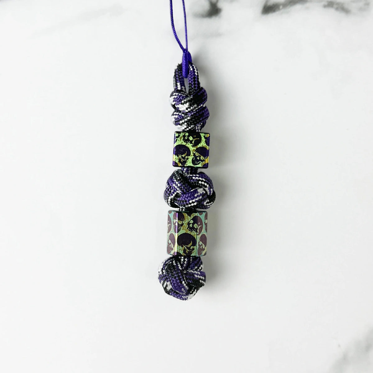 Green & Blue Skull Titanium Lanyard Beads: square and hexagonal green beads on purple cord (gallery view 24).