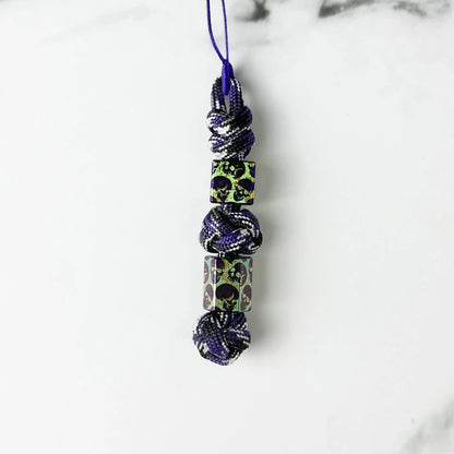 Green & Blue Skull Titanium Lanyard Beads: square and hexagonal green beads on purple cord (gallery view 24).