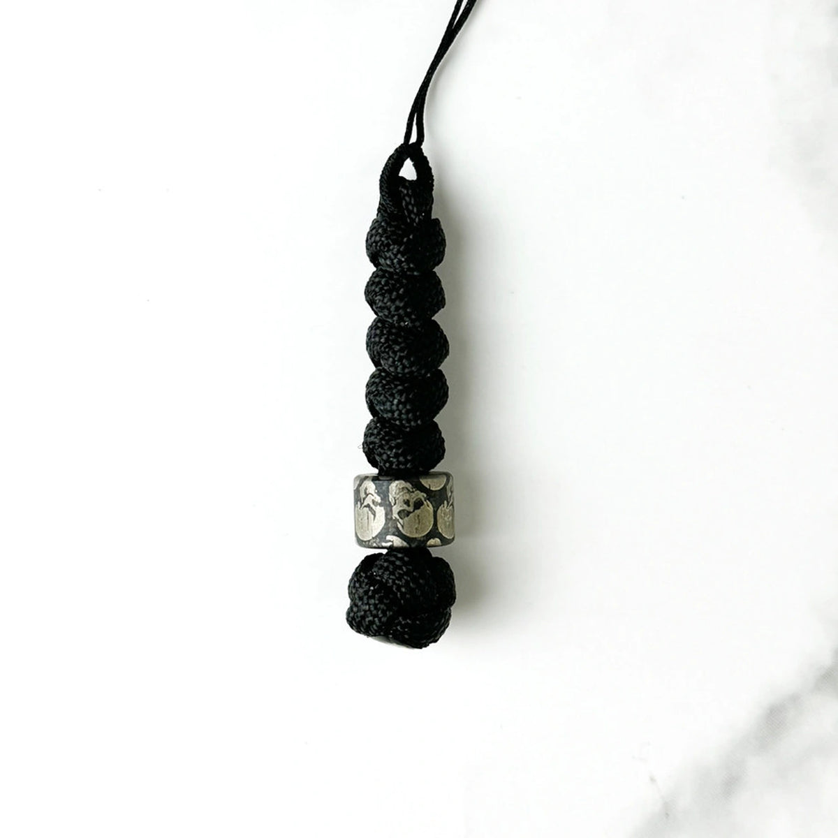 Dark Skull Titanium Lanyard Beads: square and hexagonal skull beads on black cord (gallery view 18).