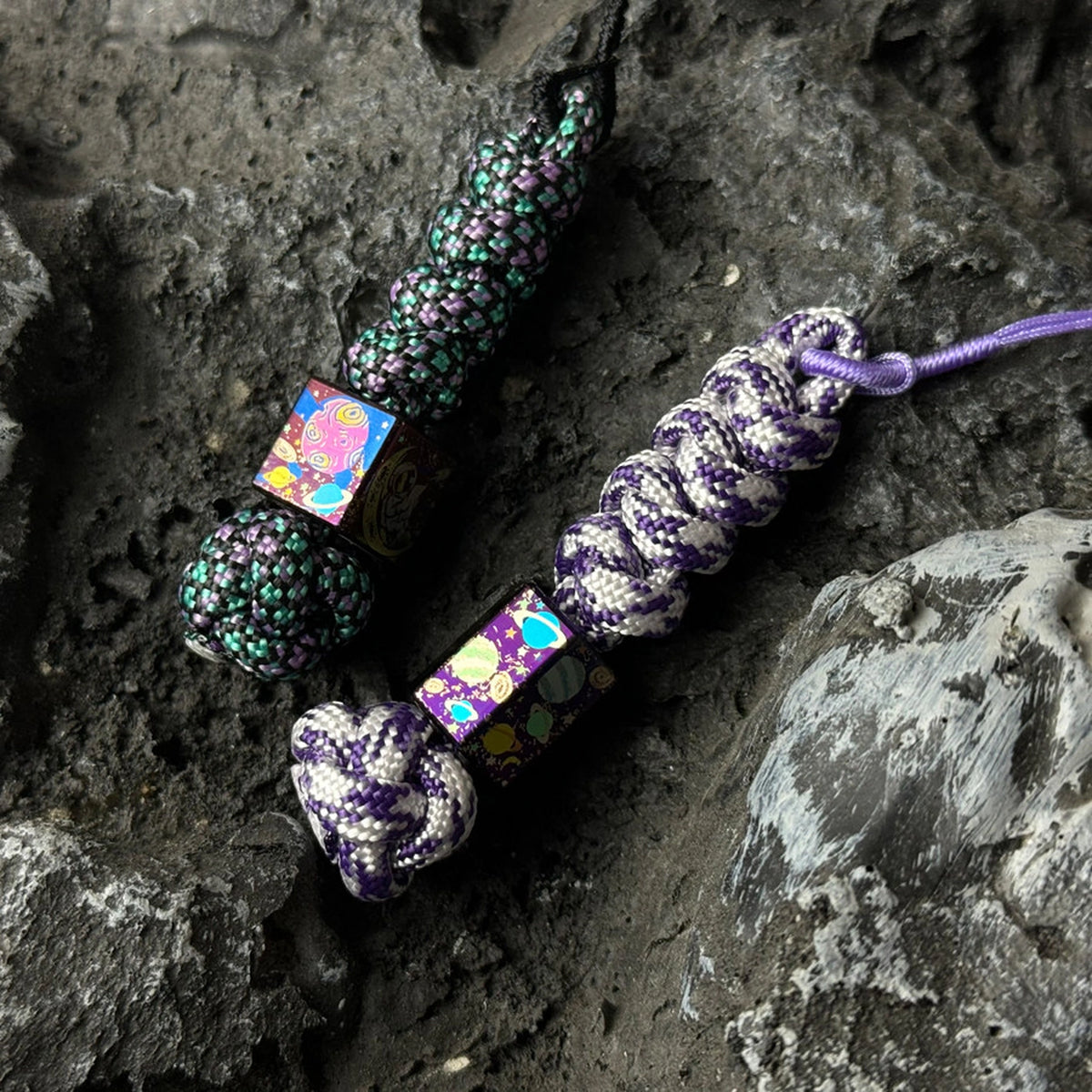 Planet Artwork Titanium Lanyard Beads: two braided lanyards with planet beads (gallery view 04).