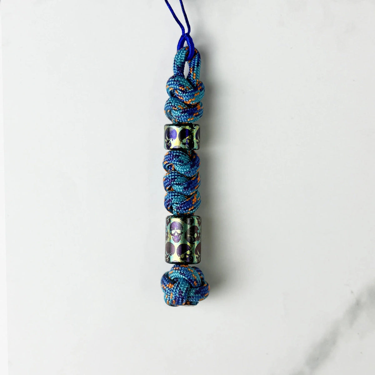 Green & Blue Skull Titanium Lanyard Beads: two green round beads on blue cord (gallery view 22).